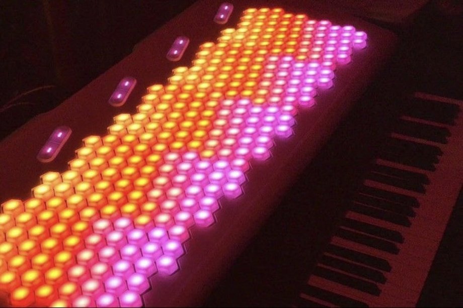 2026-02-12 Free Improvisation Ensemble / Microtonal Ensemble Keyboard with lighting in orange and pink