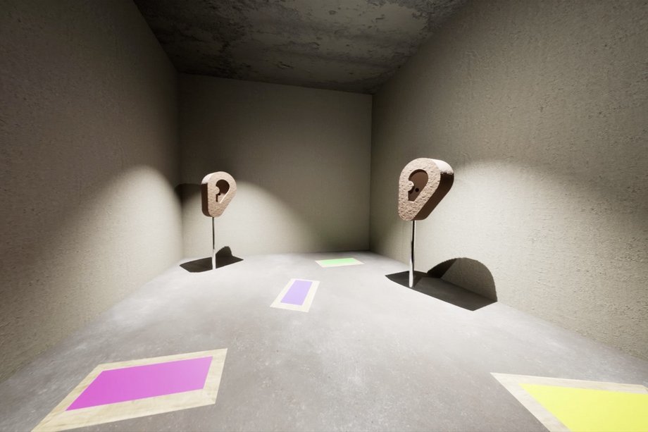 Grey room with two ear-shaped exhibitors + four colorful squares on the floor